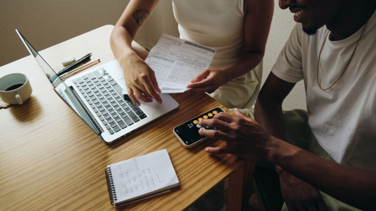 Business owners reviewing finances